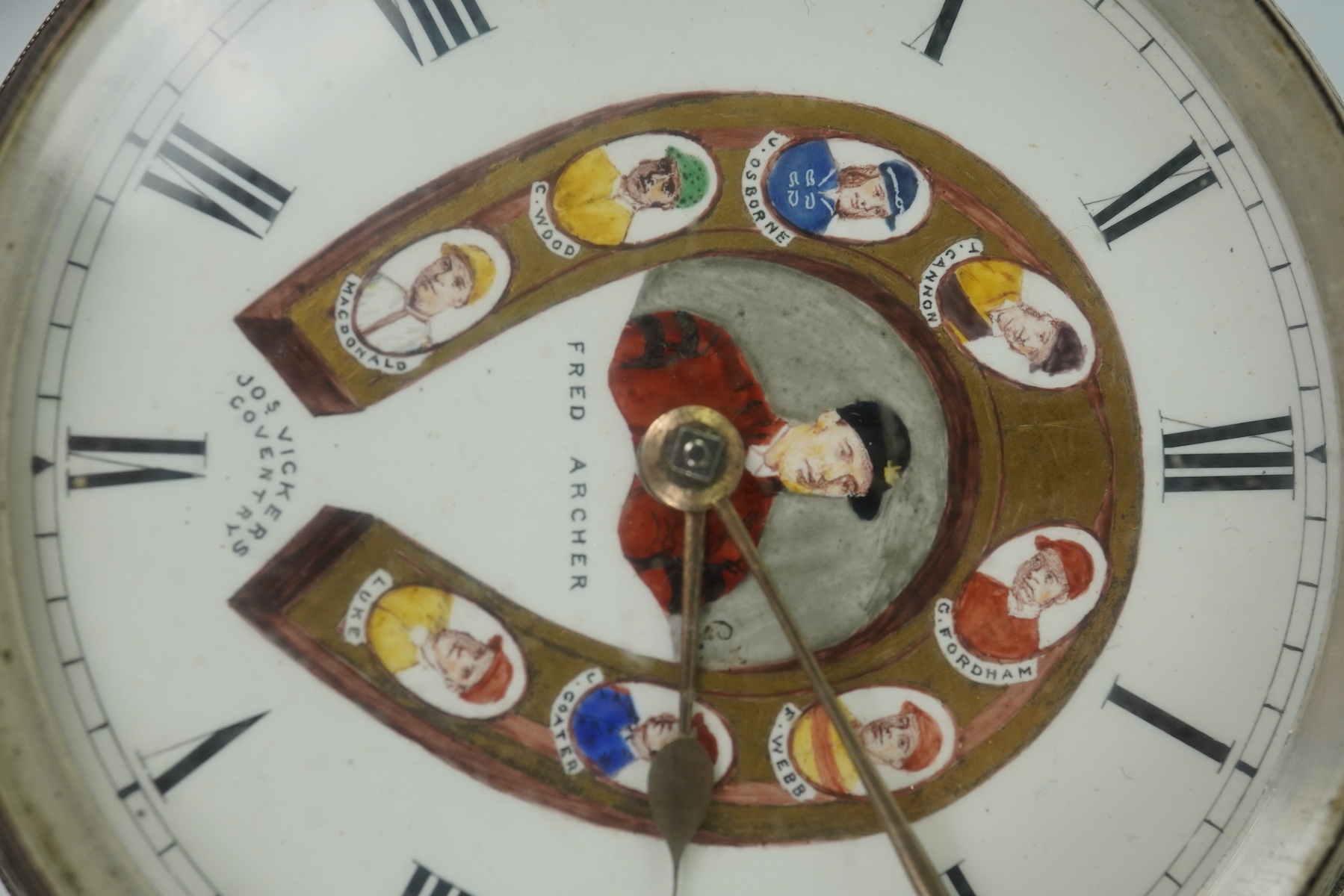 A late Victorian Horse Racing related engraved silver open faced keywind pocket watch, by J. Vickers, Leicester Road, Coventry, the enamelled dial with a signed painted bust of the jockey Fred Archer to the centre and fl